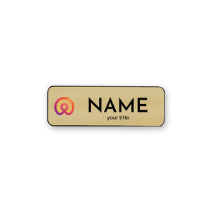 Gold name tag with a logo on a white background