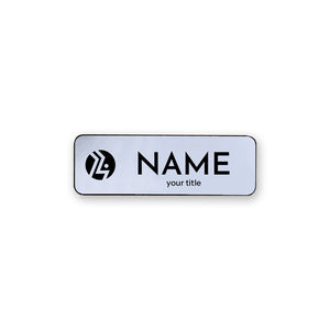 Silver name tag with laser engraved logo and name